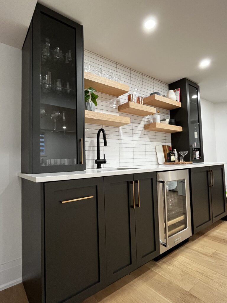 Custom black kitchen cabinets with modern design in Waterloo Ontario home renovation.